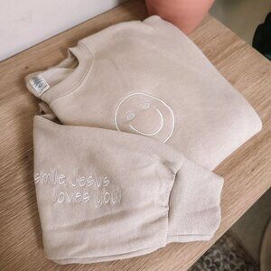 Smile, Jesus Loves You Sweatshirt – Sand Crewneck (Embroidered)